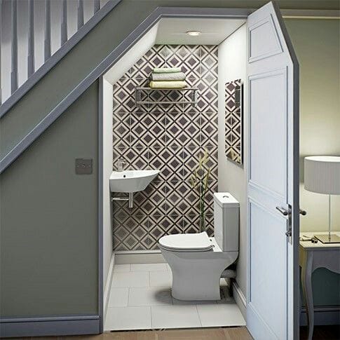 toilet space under stairs